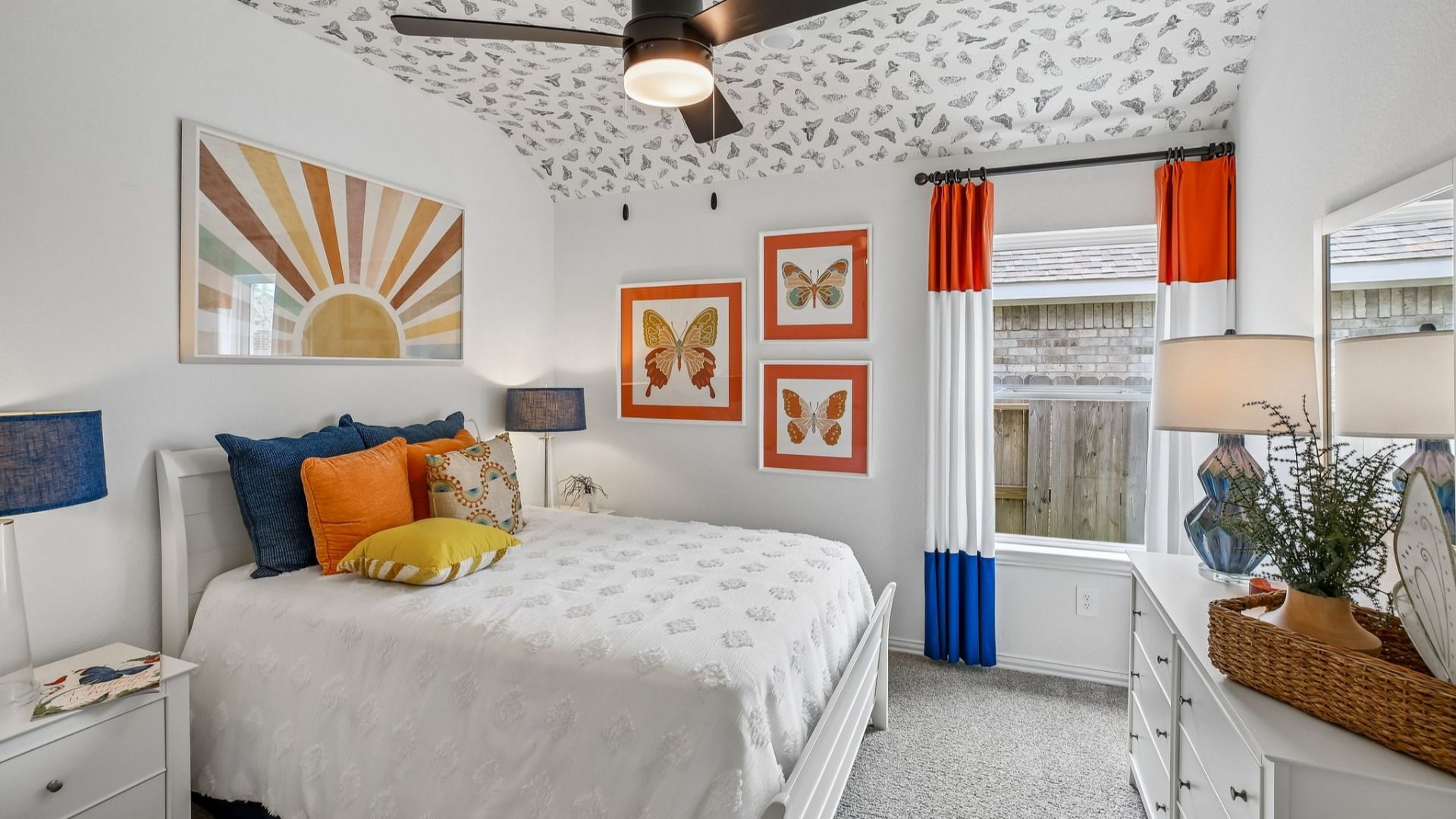 Discover refined elegance with custom butterfly ceiling, sunburst wall art, and vibrant accents in Cypress Green.