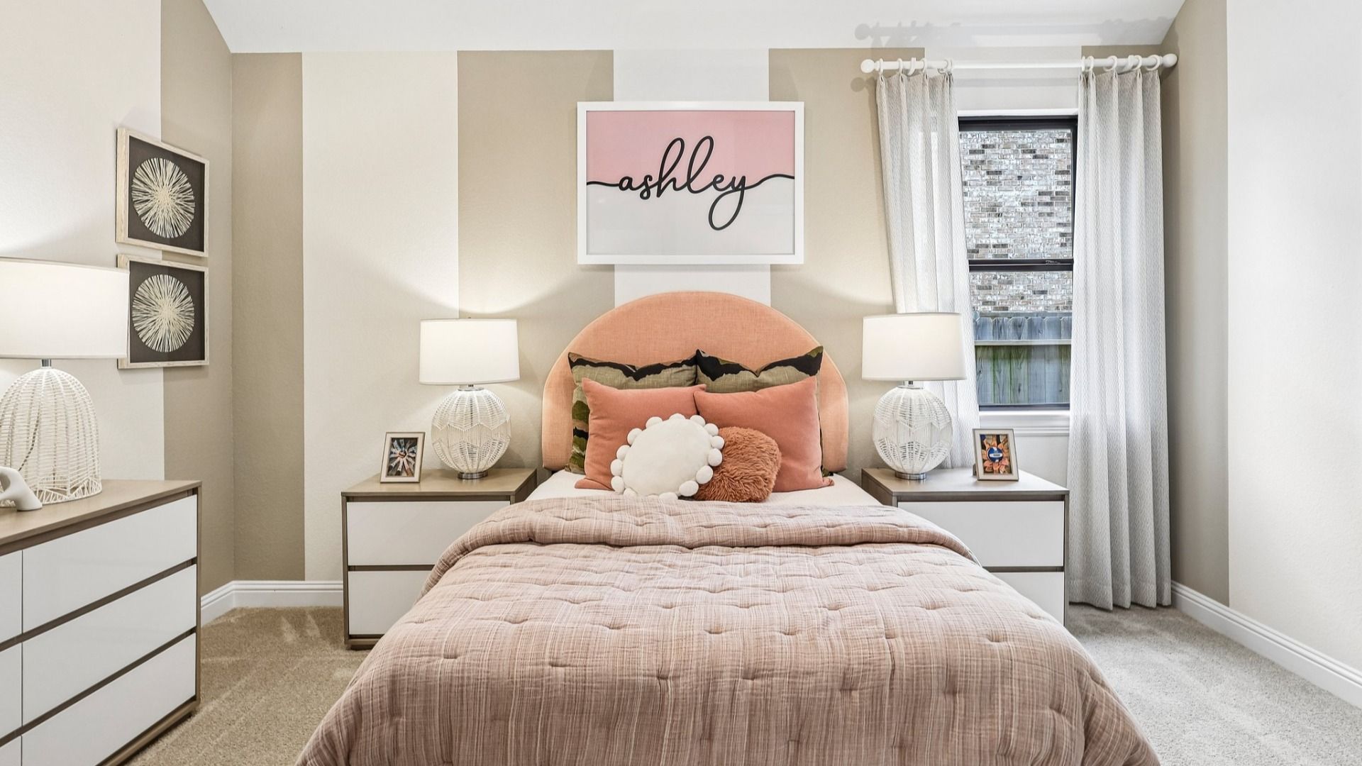 Luxurious Sunterra bedroom features plush bedding, modern accents, and ample natural light for serene living.