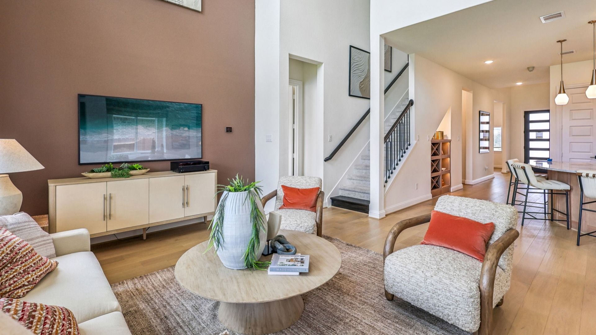 Elegant open-concept design with high ceilings and premium finishes in Brookewater community.