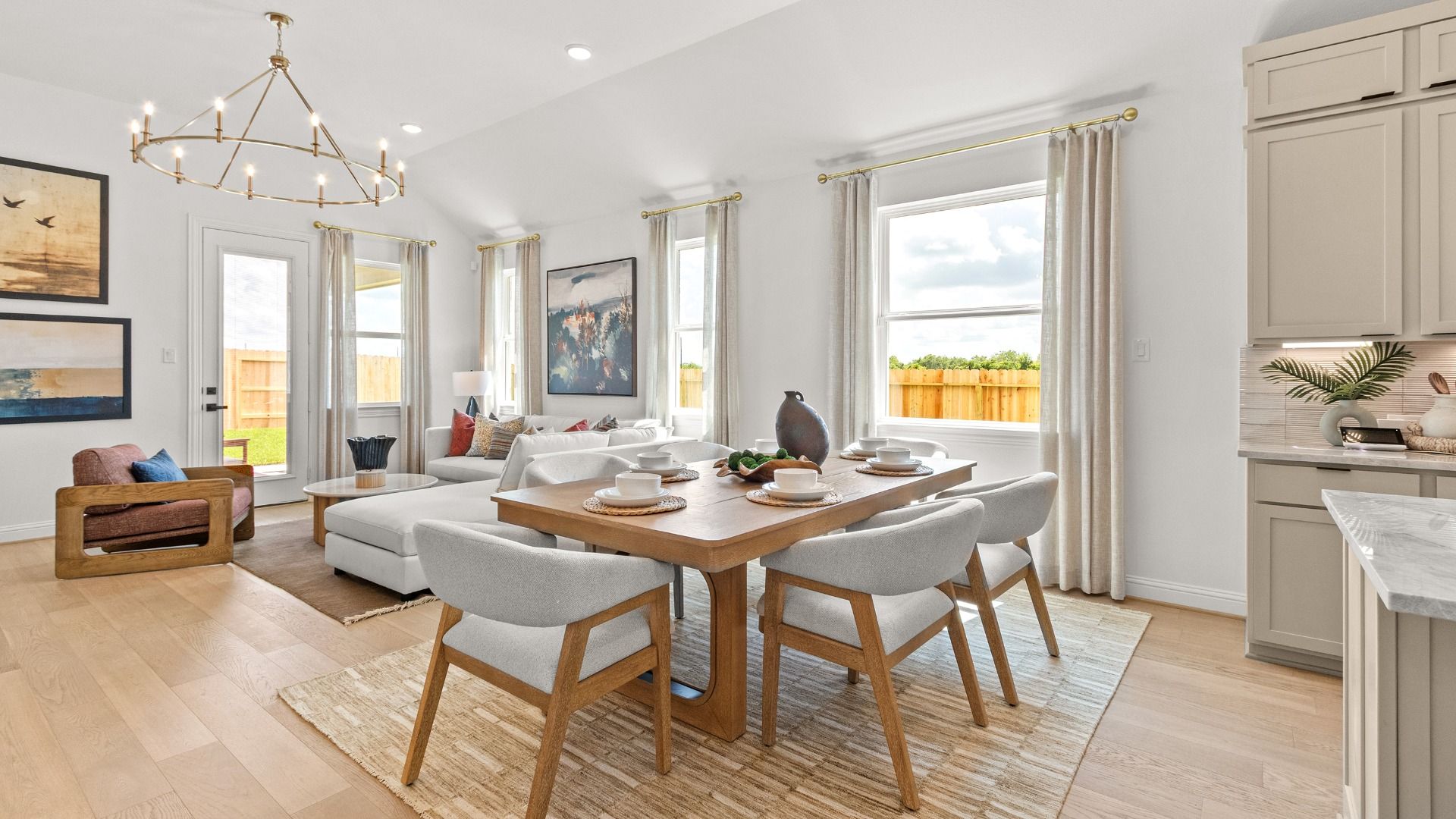 Open concept breakfast and living area featuring airy interiors and a seamless flow throughout the home.