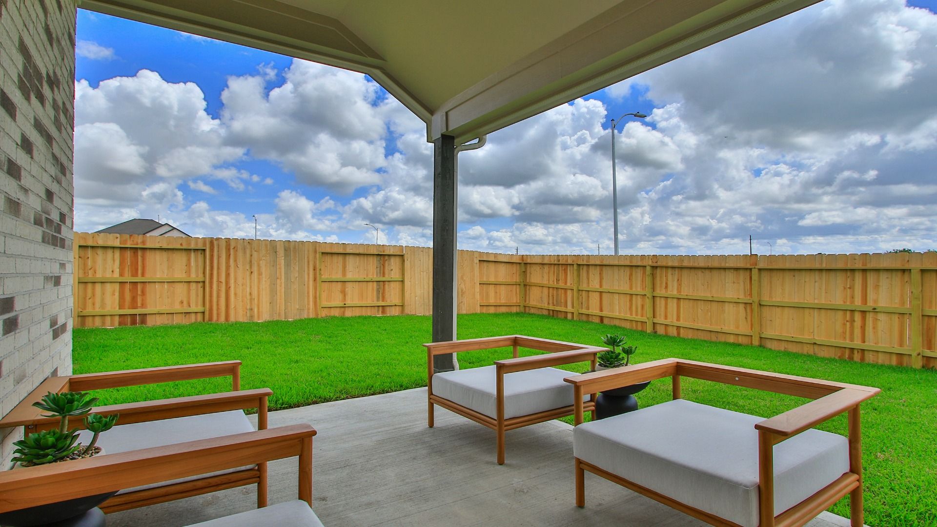 Inviting covered patio offering the perfect blend of shade and comfort.