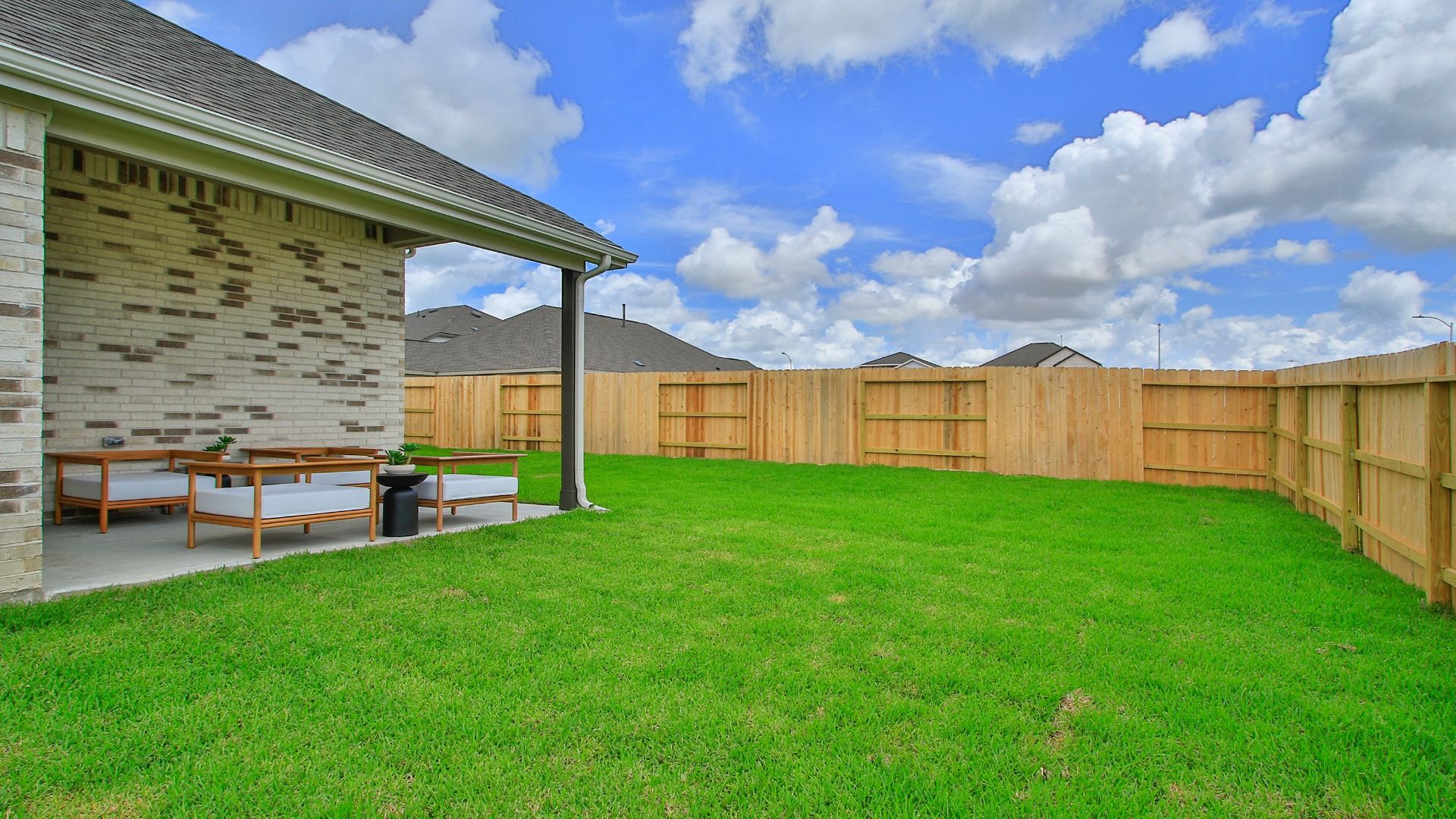 Spacious backyard in Azalea offering a beautiful open-air setting.