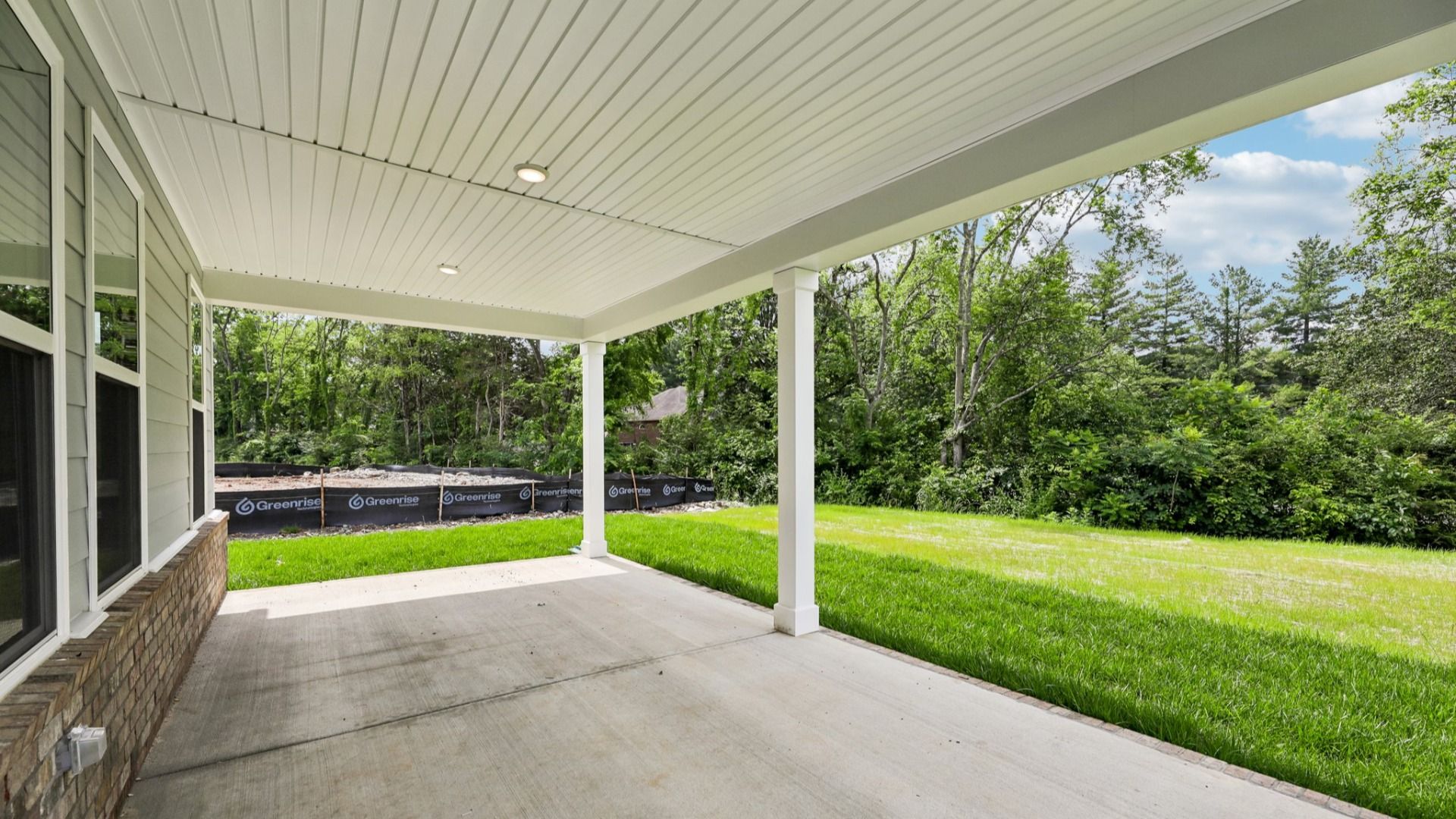 Covered Porch and Backyard