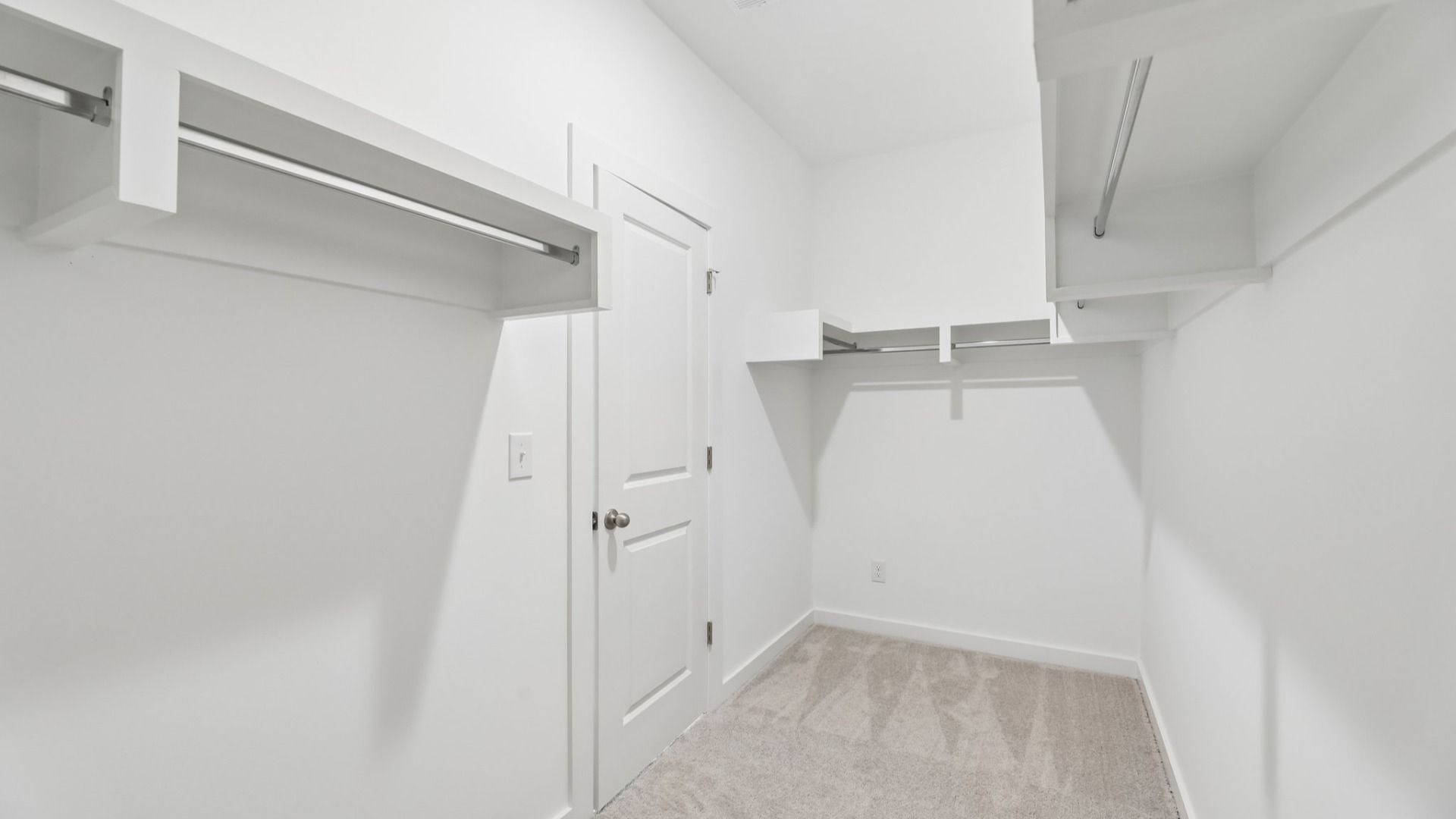 Primary Closet with built-in shelves