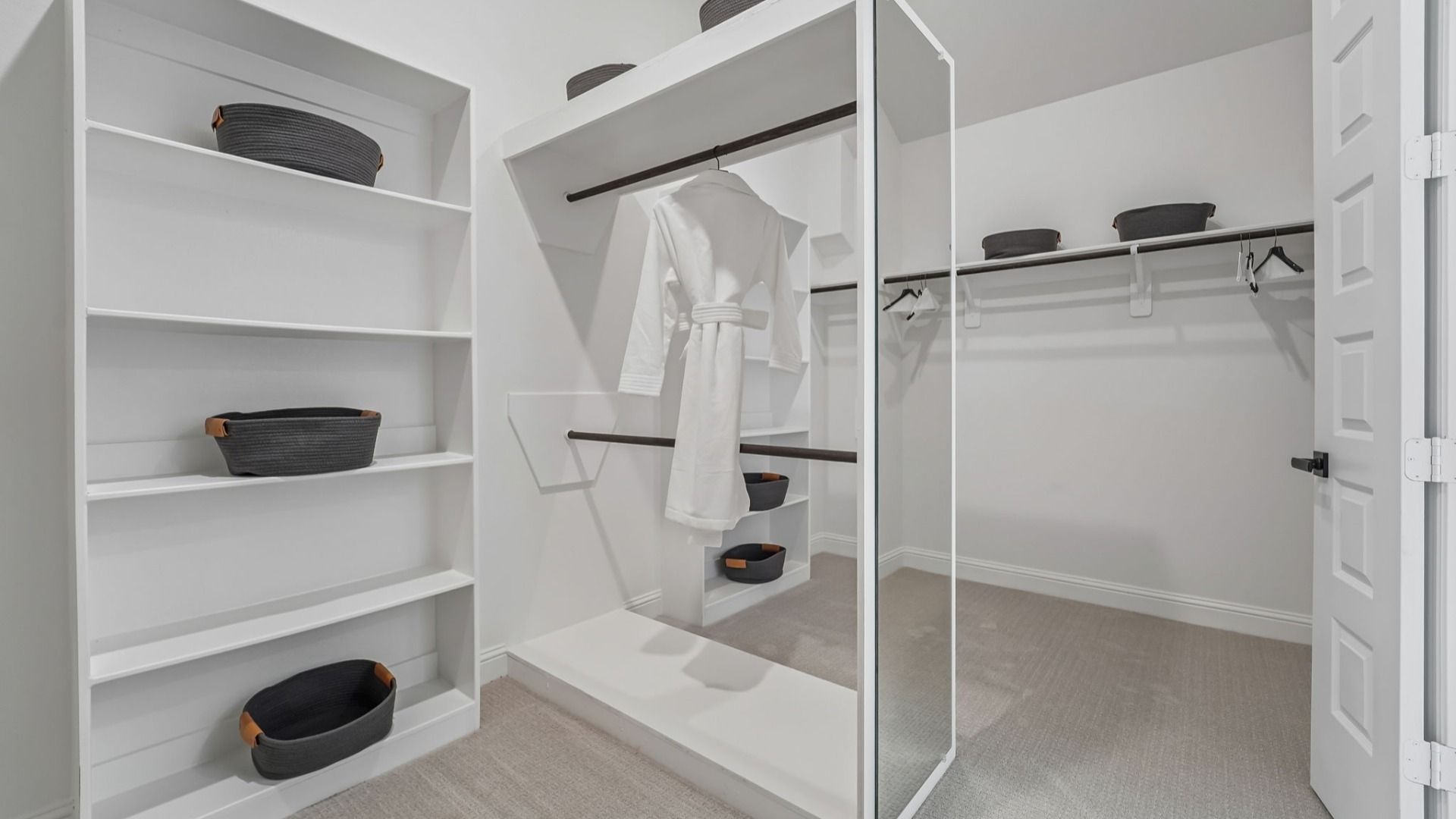 Ample Hanging Space and Perfectly Placed Mirror in Woodlands Hills Primary Closet