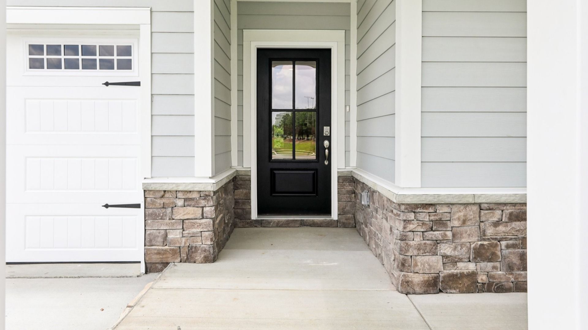 Front Exterior Entryway with black door