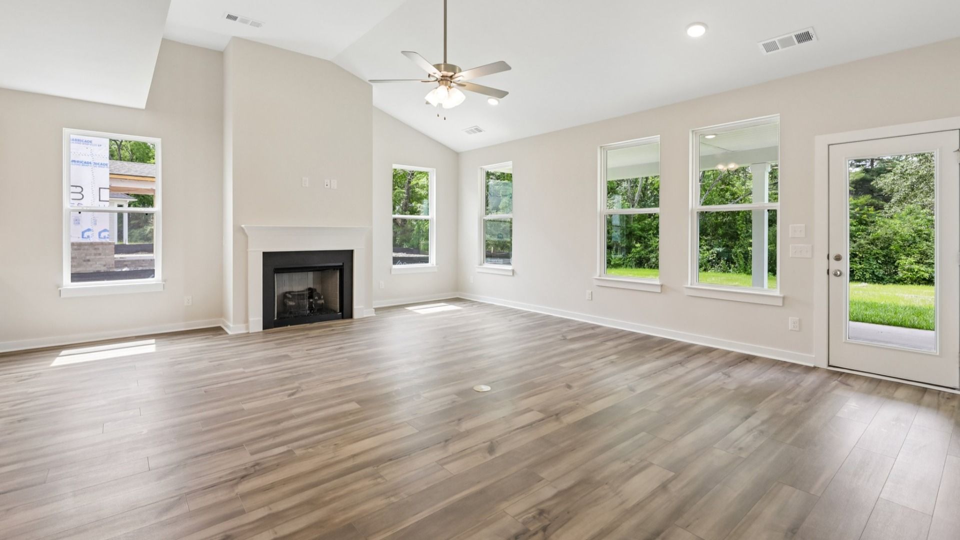 Gathering Room with windows and fireplace