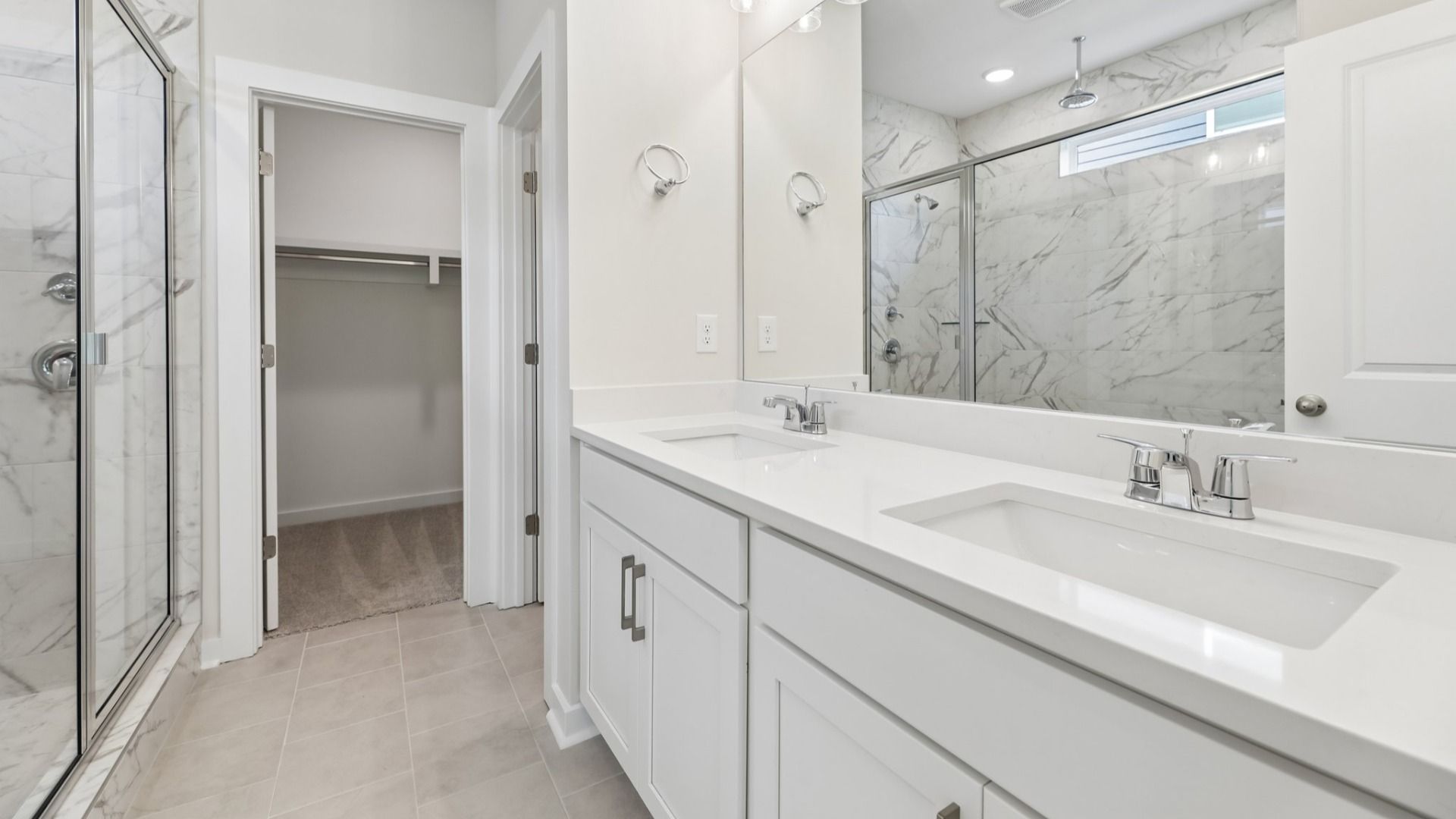 Primary bathroom with dual vanity