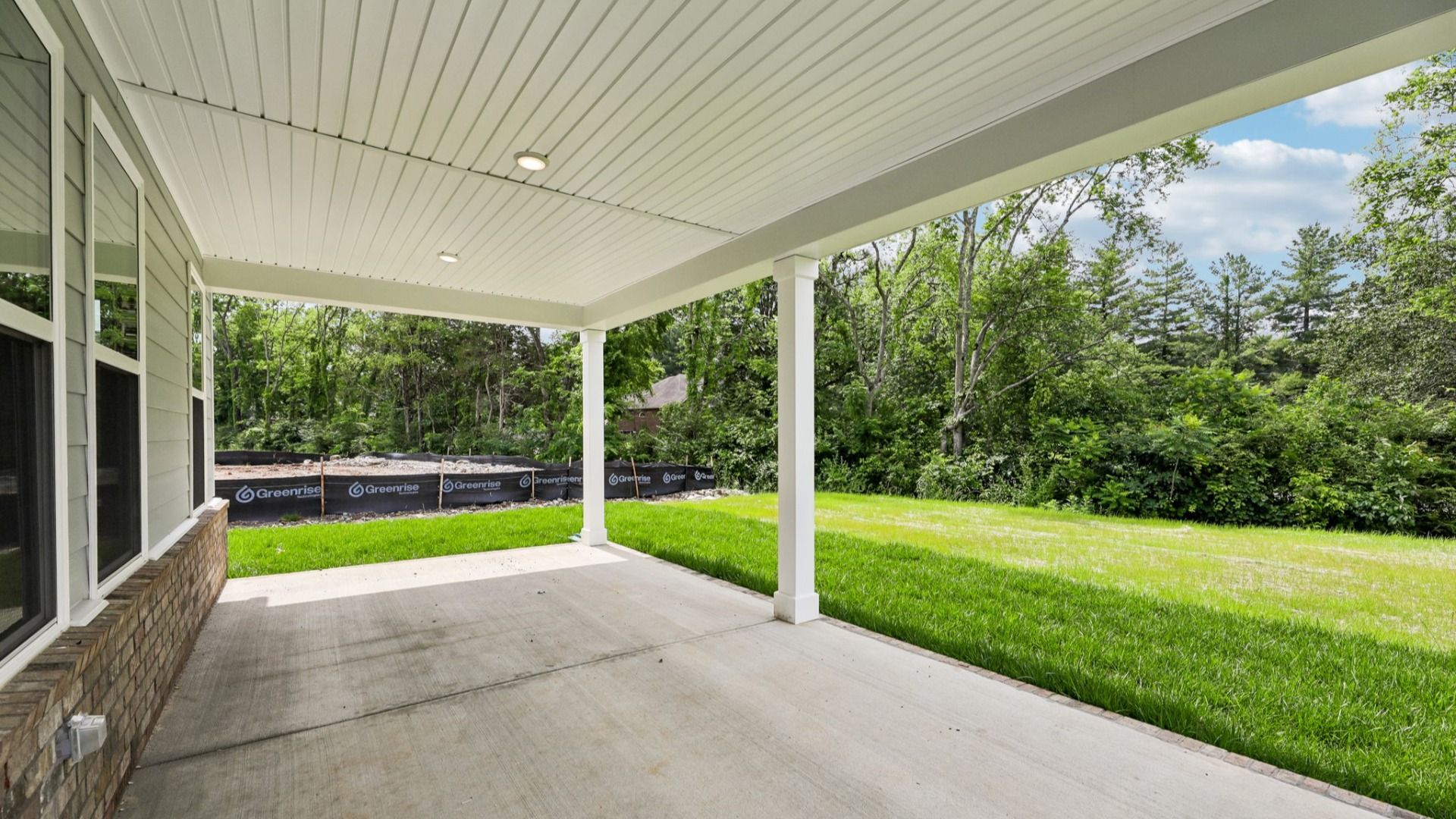 Covered Porch and Backyard