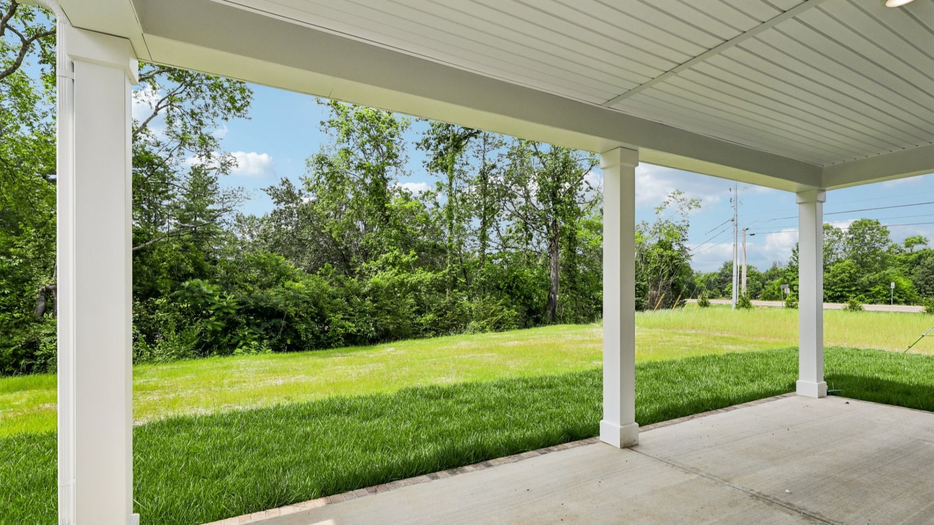 Covered Porch and Backyard