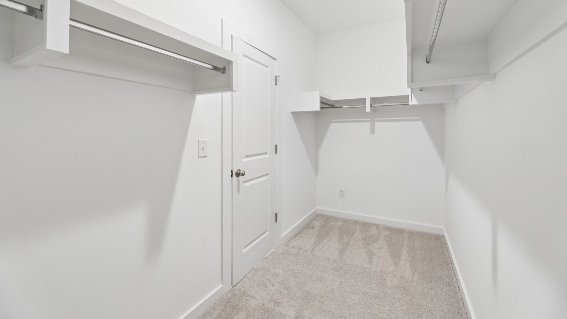 Primary Closet with built-in shelves