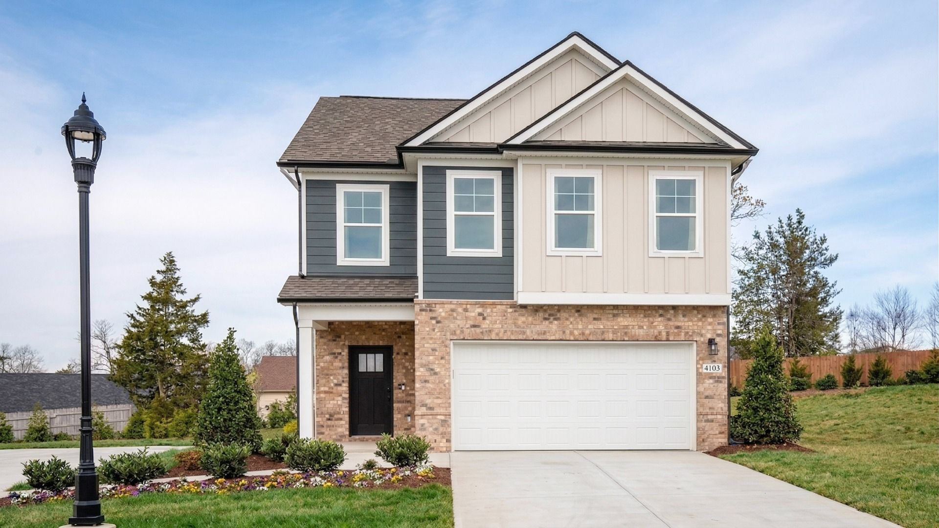 Front exterior with 2-car garage