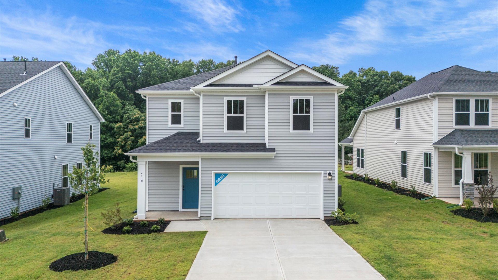 Front exterior with 2-car garage