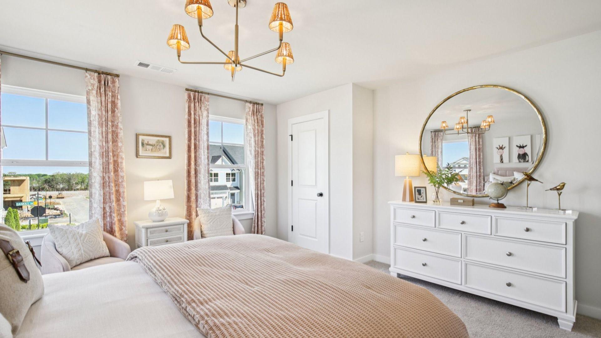 Bedroom with carpet and windows