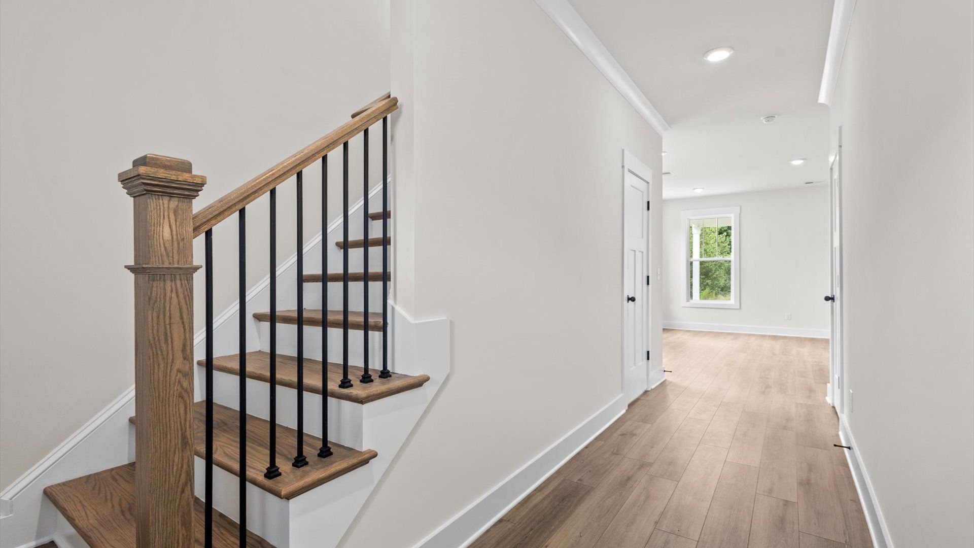 Hallway with access to staircase