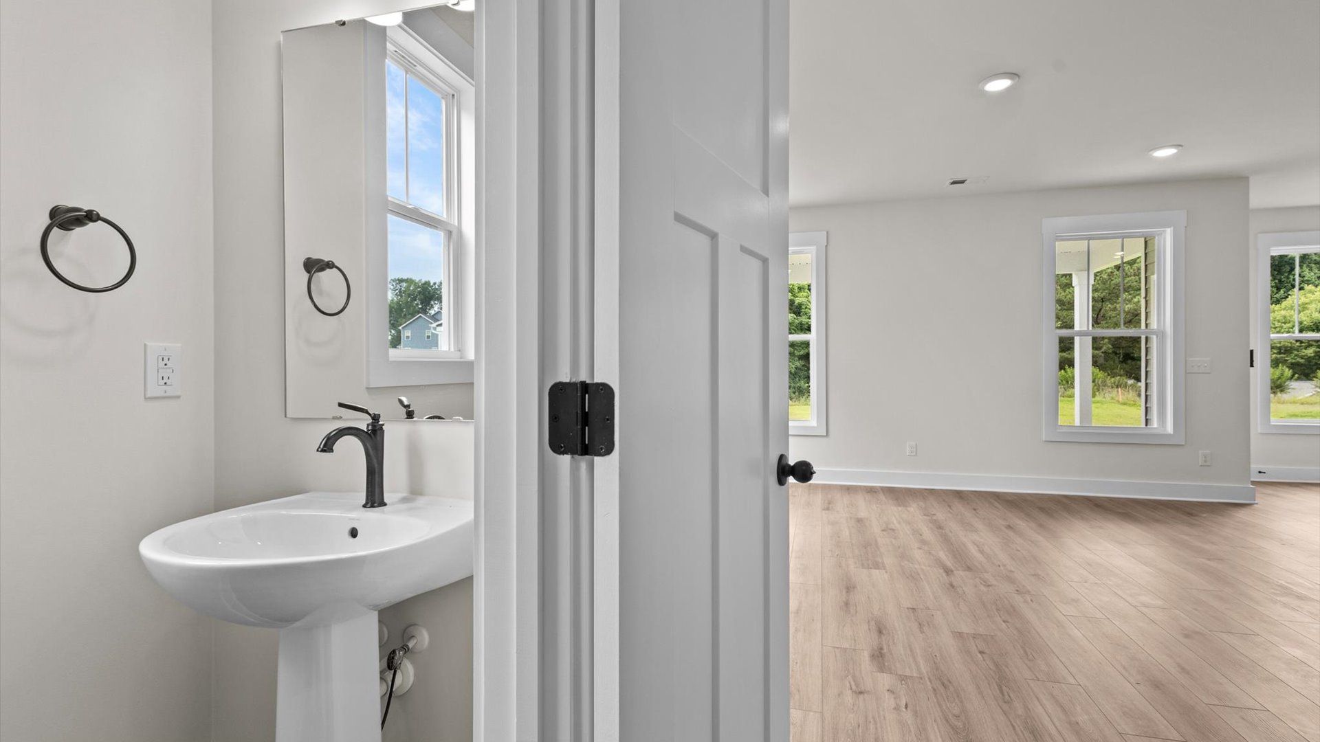 Powder room with access to gathering room