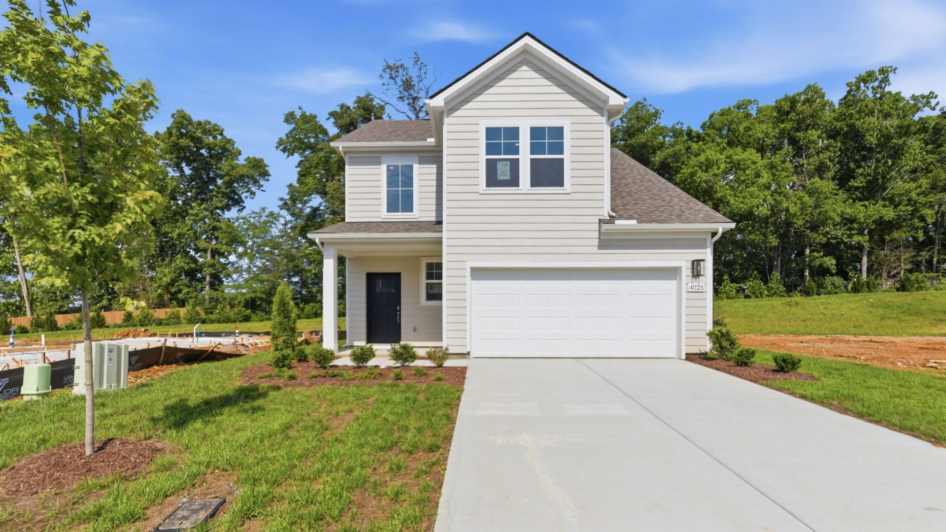 Exterior with 2-car garage