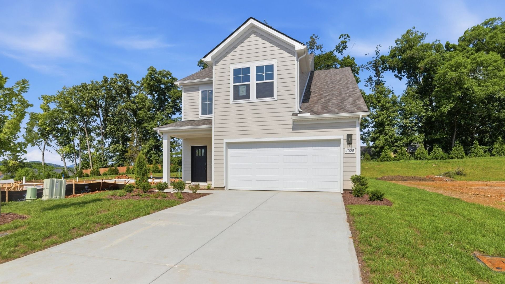 Exterior with 2-car garage