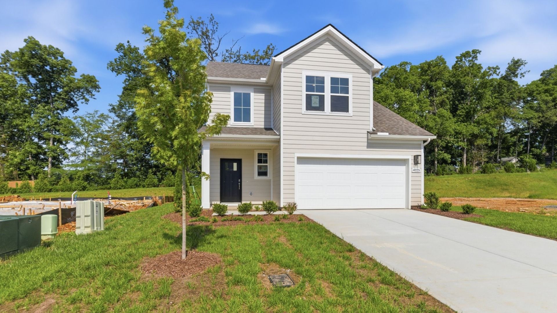 Exterior with 2-car garage