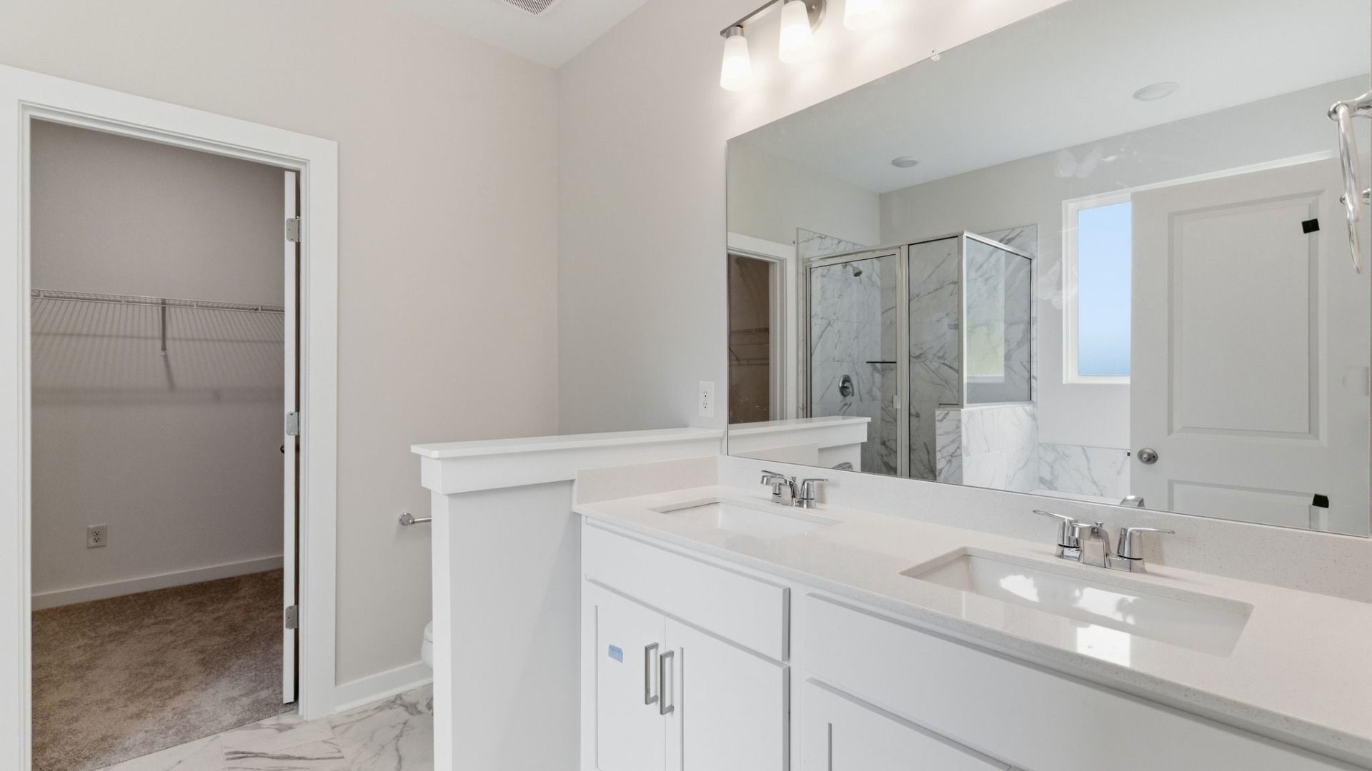 Primary bathroom with dual vanity
