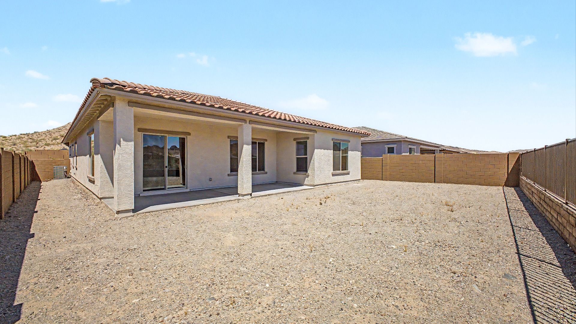 Backyard exterior at this move-in ready DRB home at Hacienda at Estrella, 16825 W. Ardmore Road, Goodyear, Arizona 85338.
