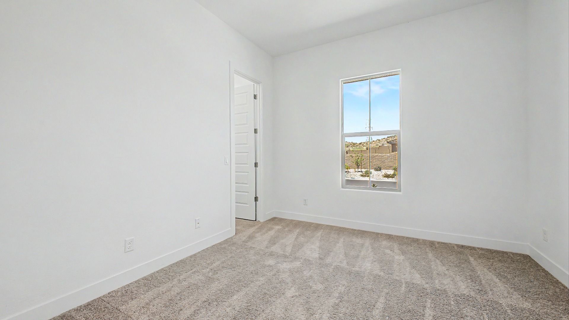 Second bedroom view in the move-in ready DRB home at Hacienda at Estrella, 16825 W. Ardmore Road, Goodyear, Arizona 85338.