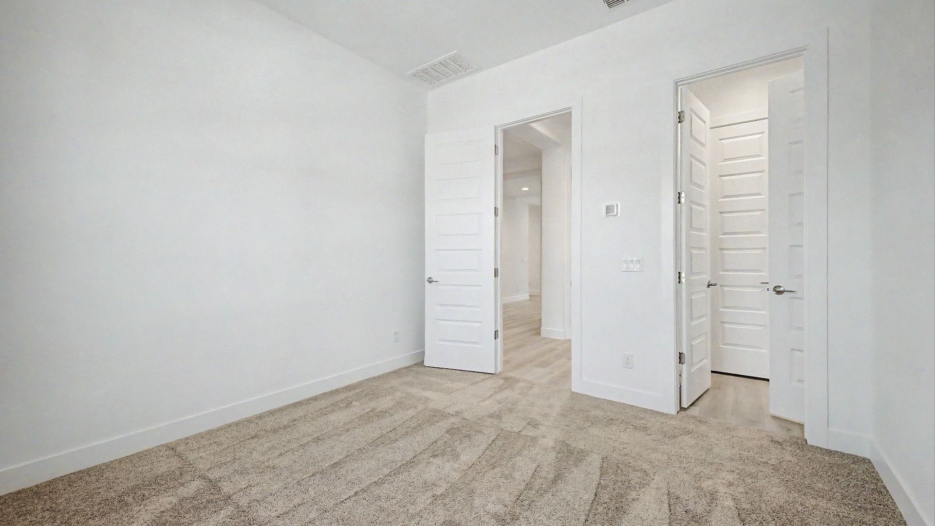 Third bedroom entry inside the move-in ready DRB home at Hacienda at Estrella, 16825 W Ardmore Rd, Goodyear, Arizona 85338.