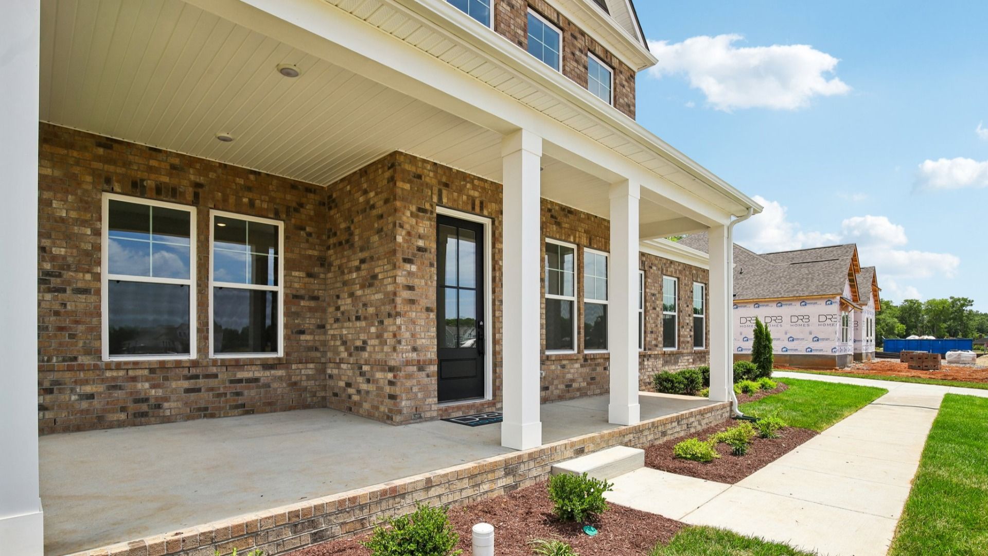 Exterior front entryway with covered porch