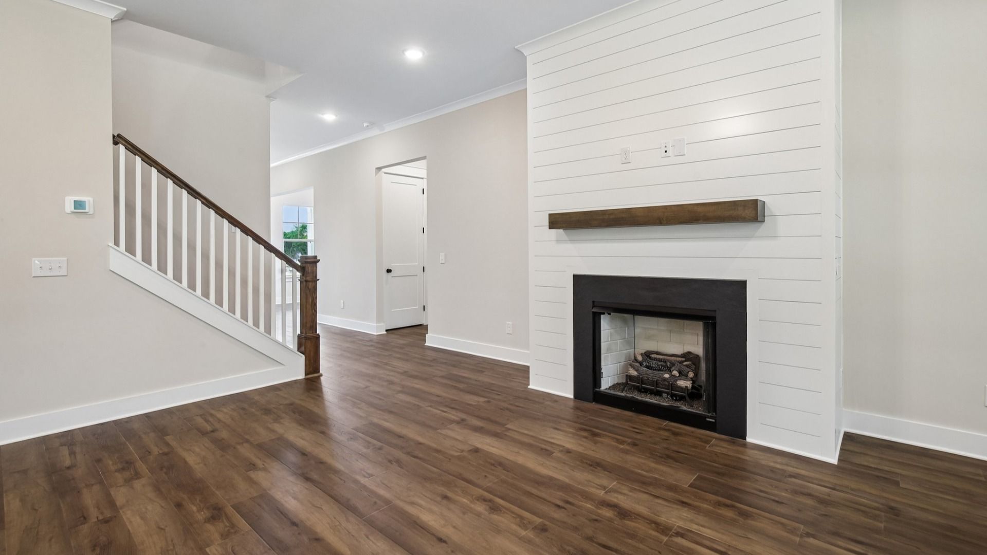 Gathering room with access to stairs