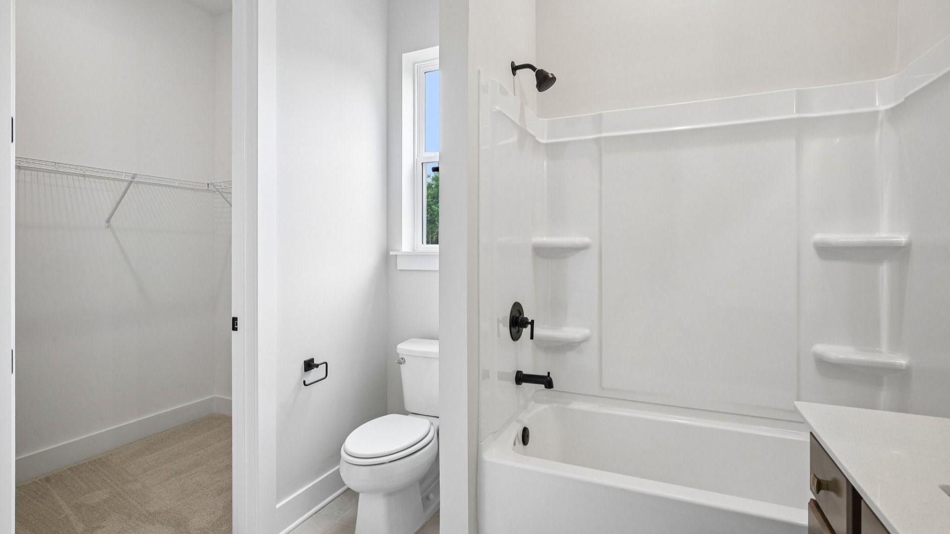 Bathroom with access to closet