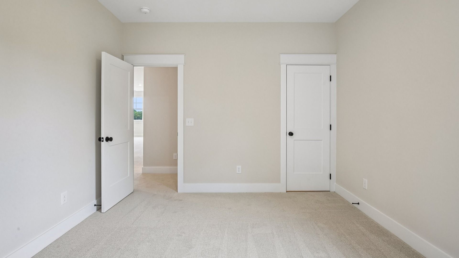 Bedroom with carpet and closet