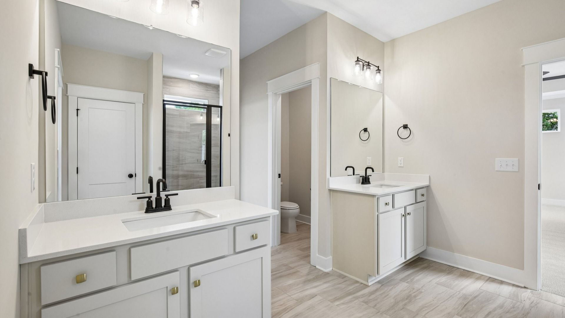 Primary bathroom with dual vanity