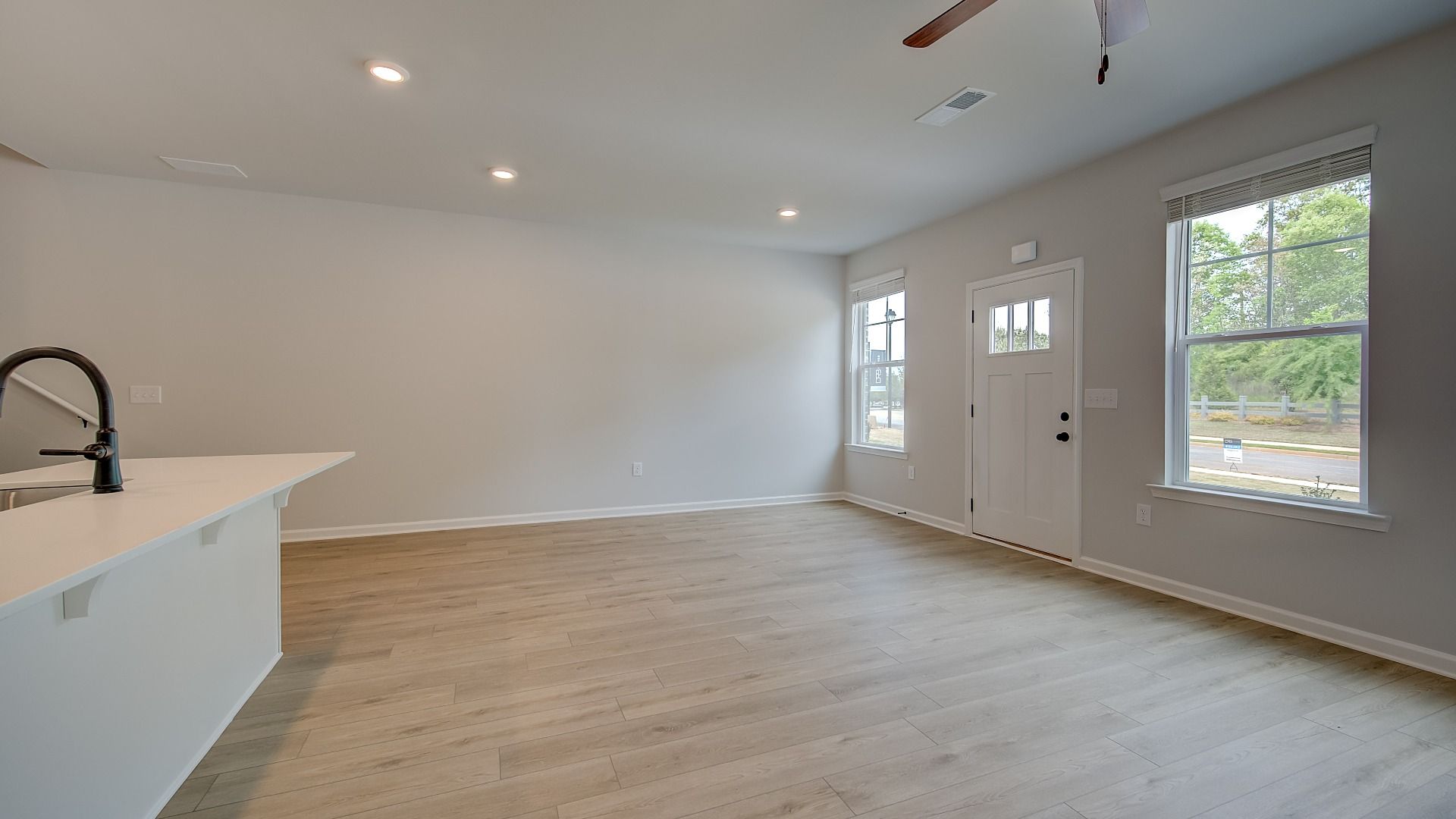 Dining area with natural lighting from windows