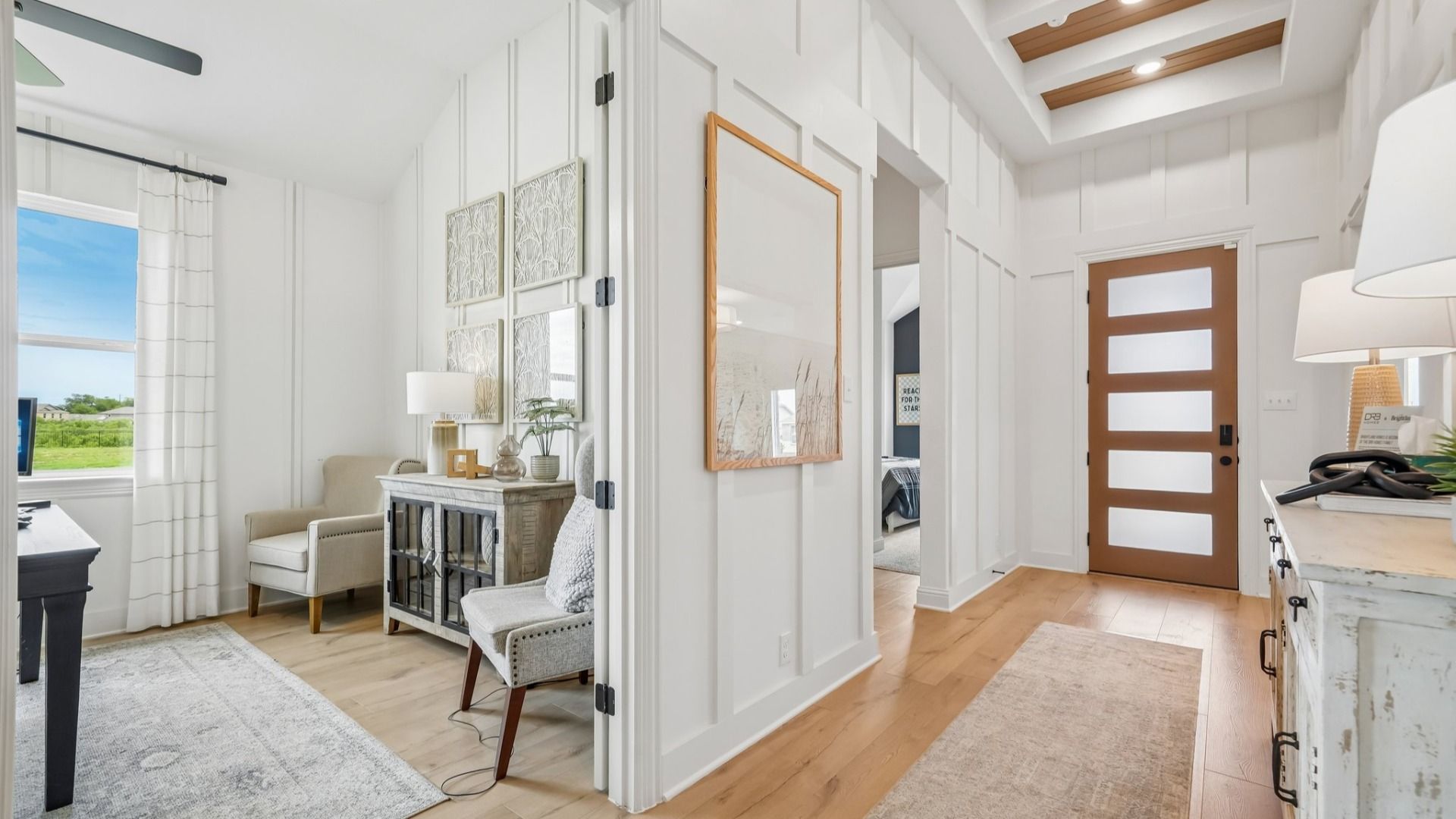 Bright entryway with natural wood accents, modern design, and bright welcoming design