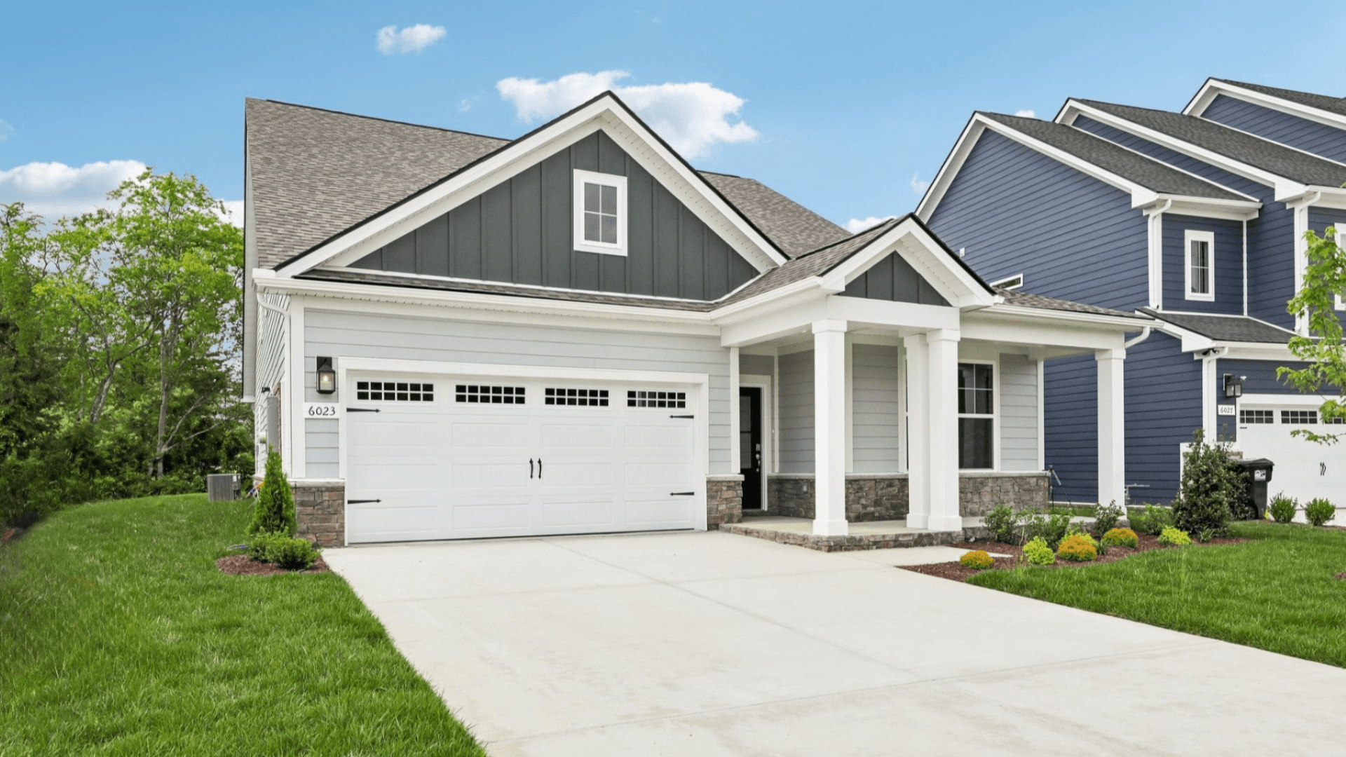 Front exterior with 2-car garage