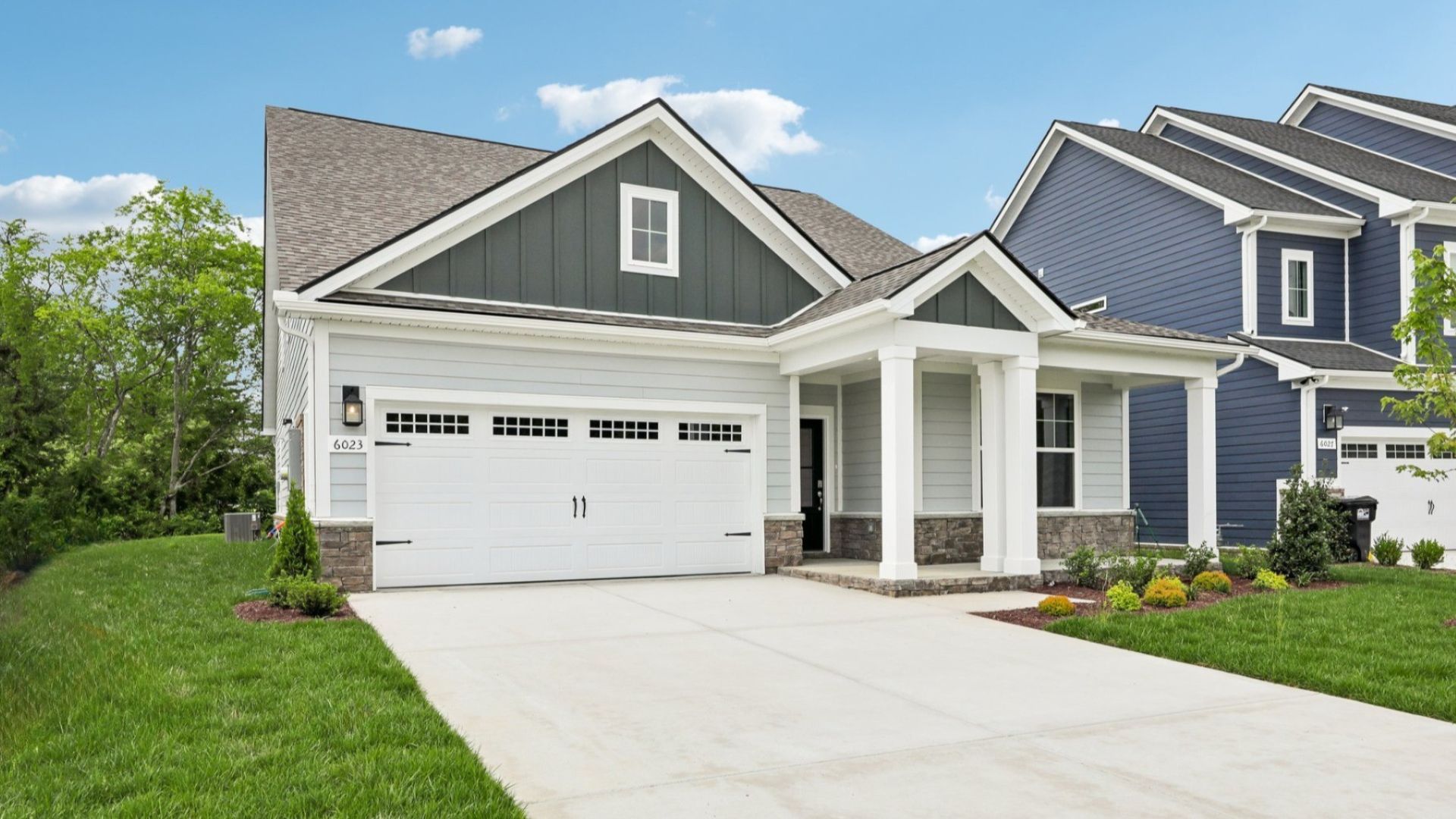 Front exterior with 2-car garage