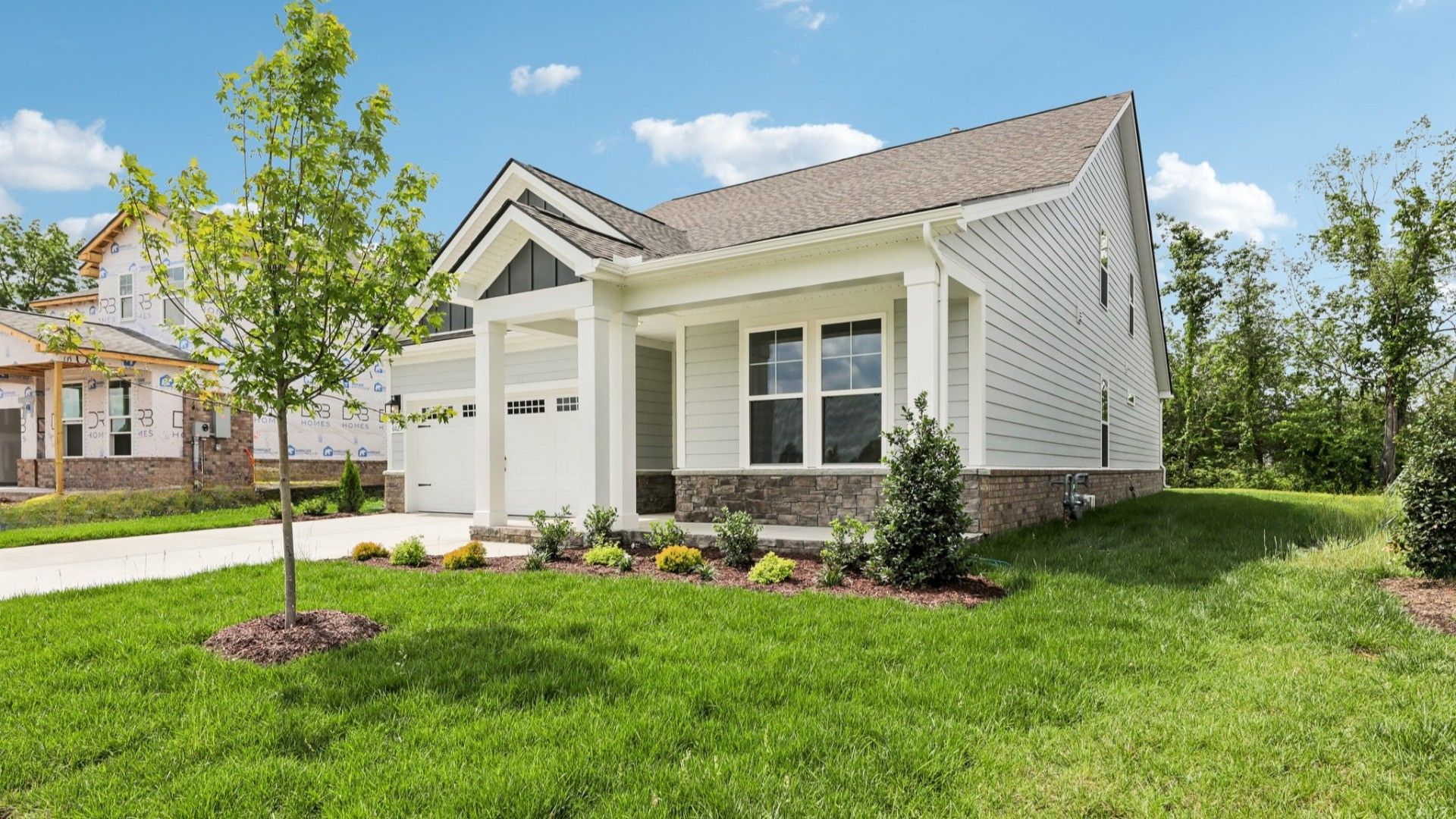 Front exterior with 2-car garage