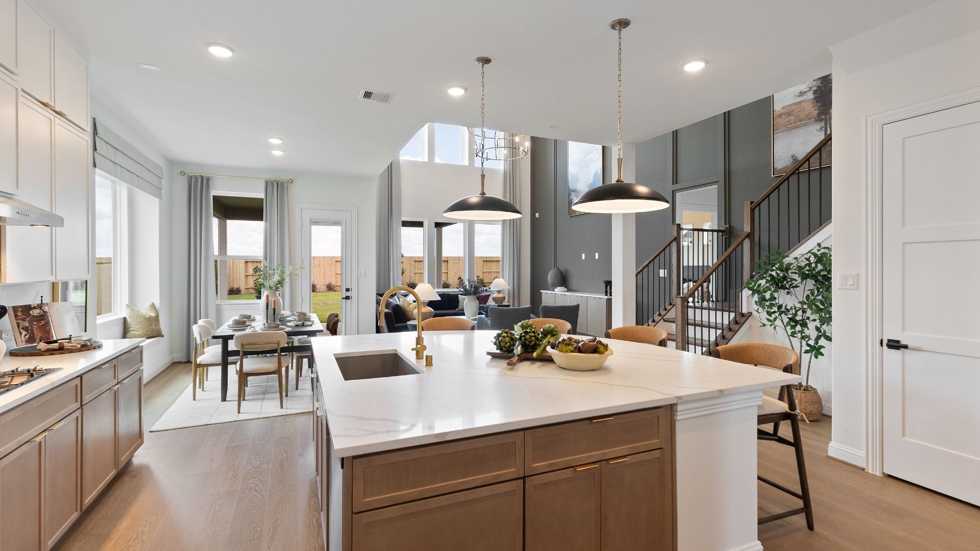 Open sightlines and open concept living blend together beautifully in the main living areas of this Rosewood home.