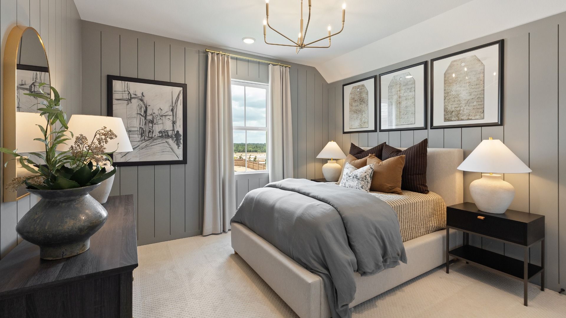 Chic junior suite with grey walls and gold accents in the Rosewood model.