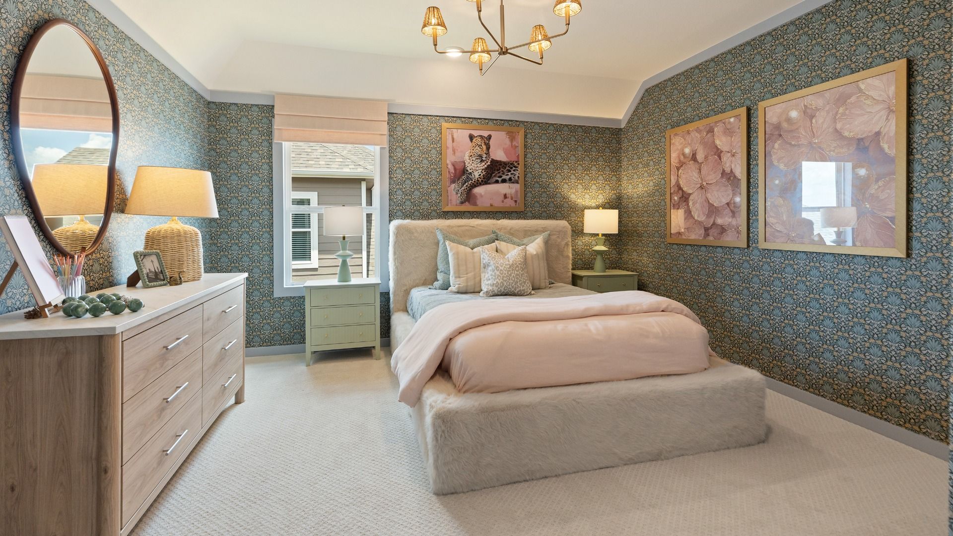 Elegant secondary bedroom with floral sage wallpaper and pink and gold accents in the Rosewood model.