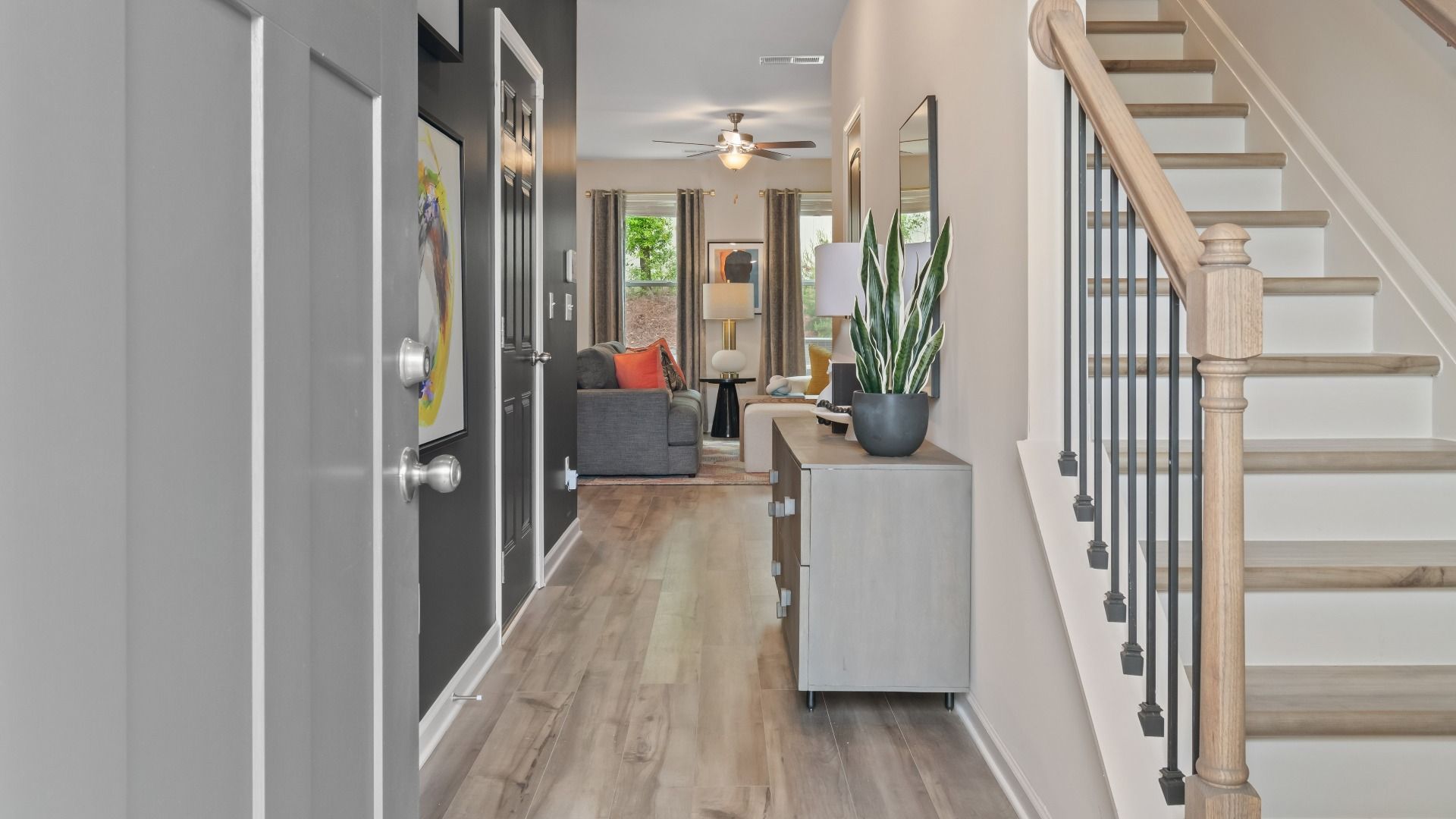 Entryway into the home with access to staircase