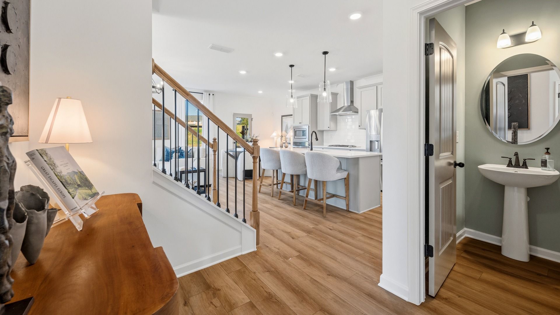 Entryway to main living areas with access to powder room