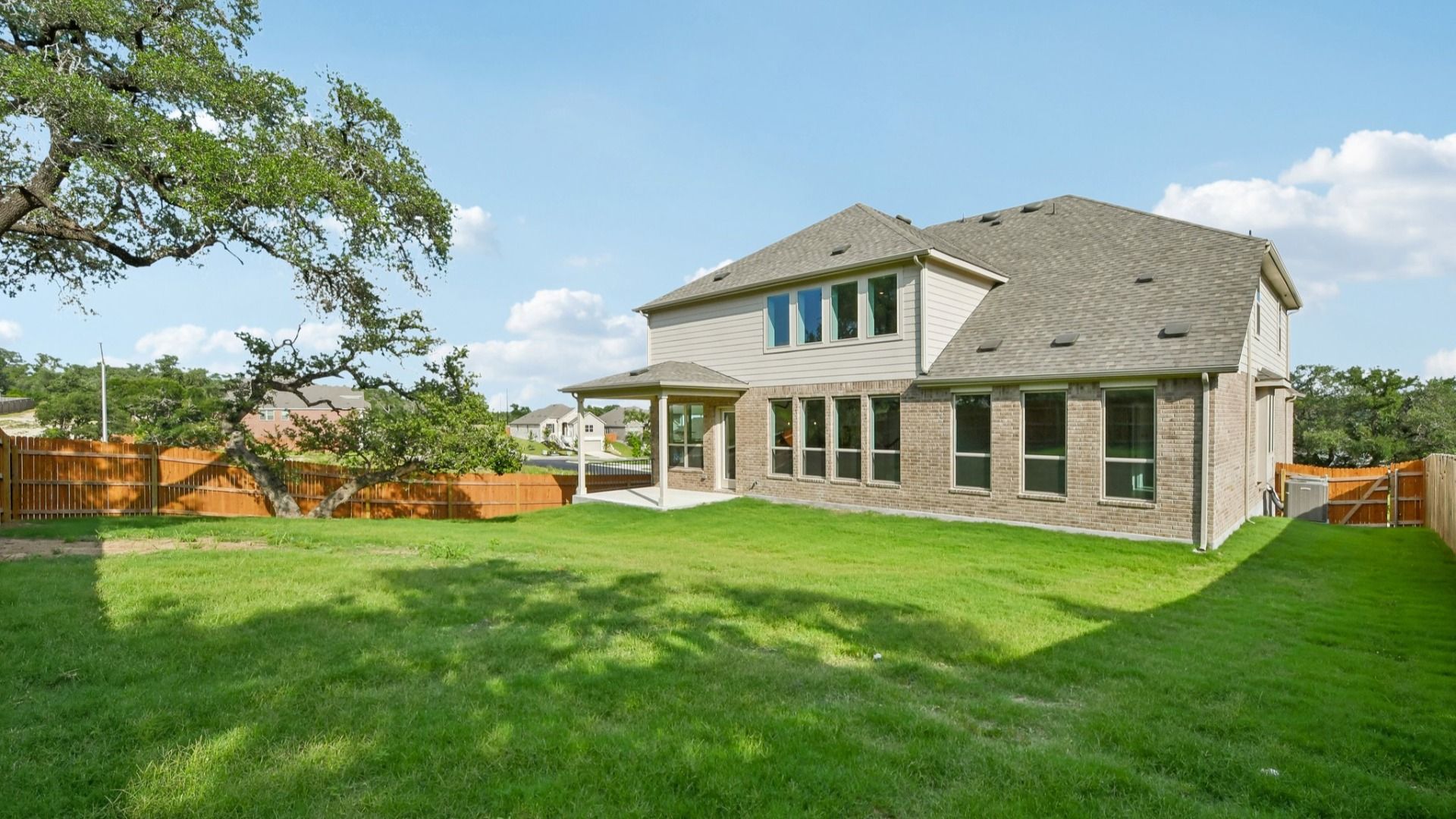 A backyard shot of the Brown floorplan at Retreat at San Gabriel - Representative Image