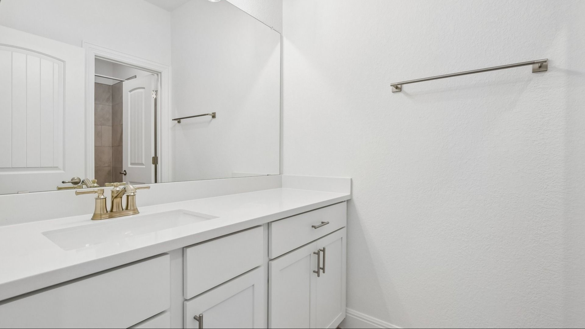 A bathroom in the Brown floorplan at Retreat at San Gabriel - Representative Photo