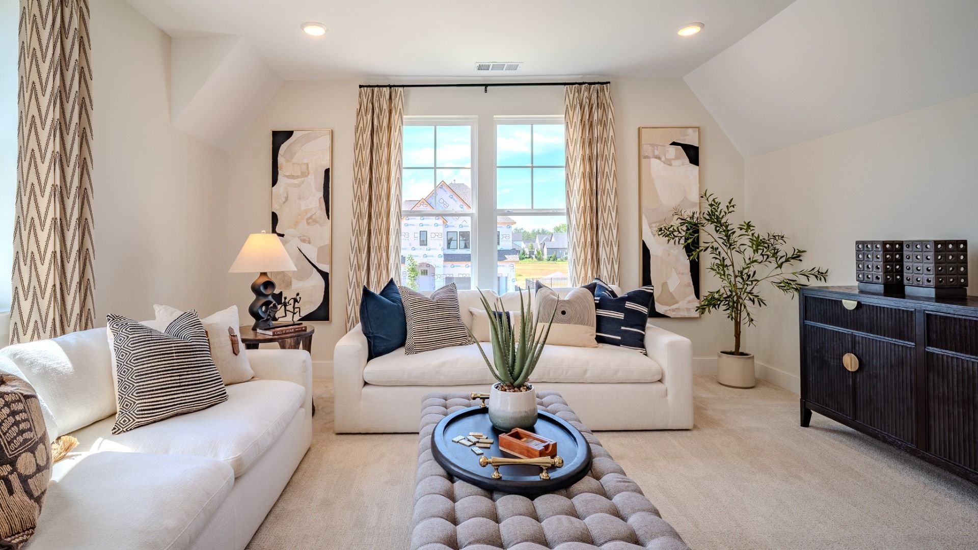 Bonus room with carpet flooring and plenty windows