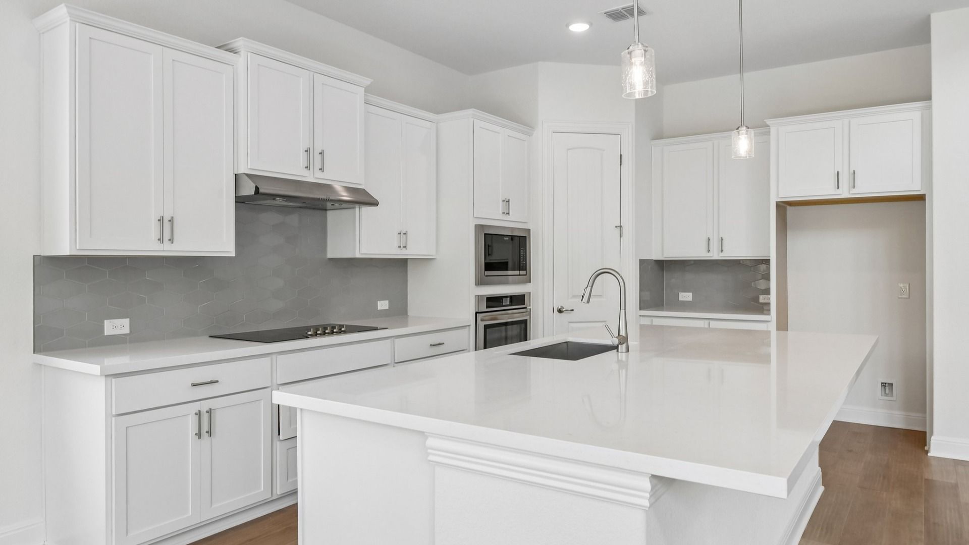 An interior shot of the kitchen in Brown floorplan at Retreat at San Gabriel - Representative Image