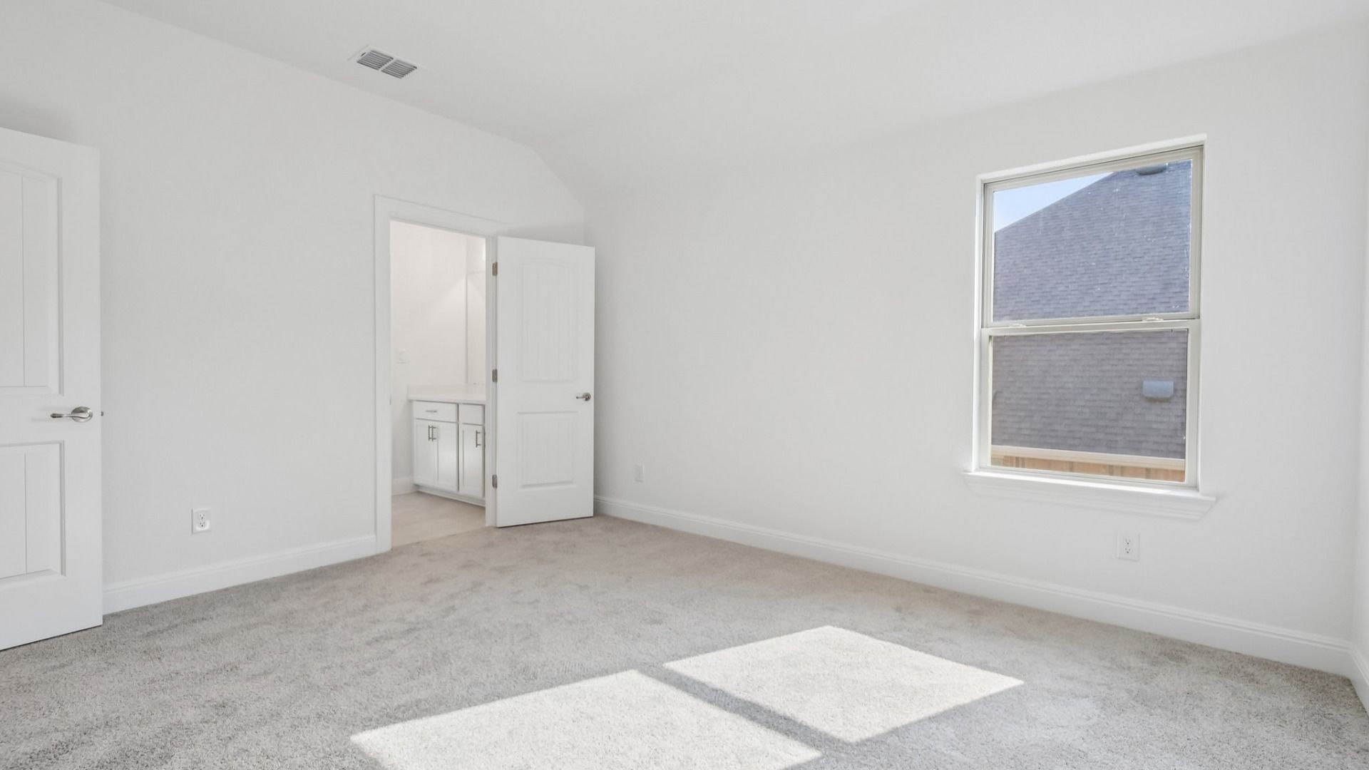 An interior shot of a bedroom in the Brown floorplan at Retreat at San Gabriel - Representative Image
