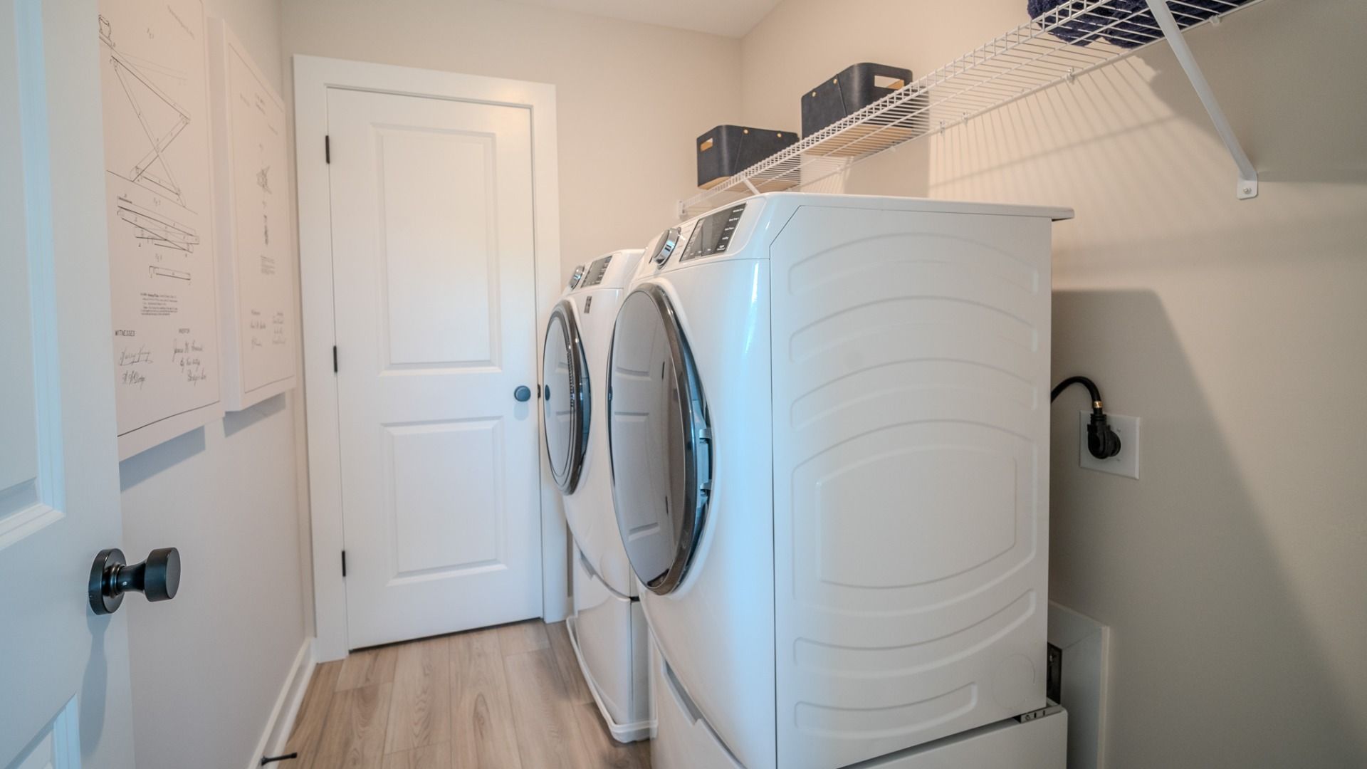 Dedicated laundry space with ventilated shelf
