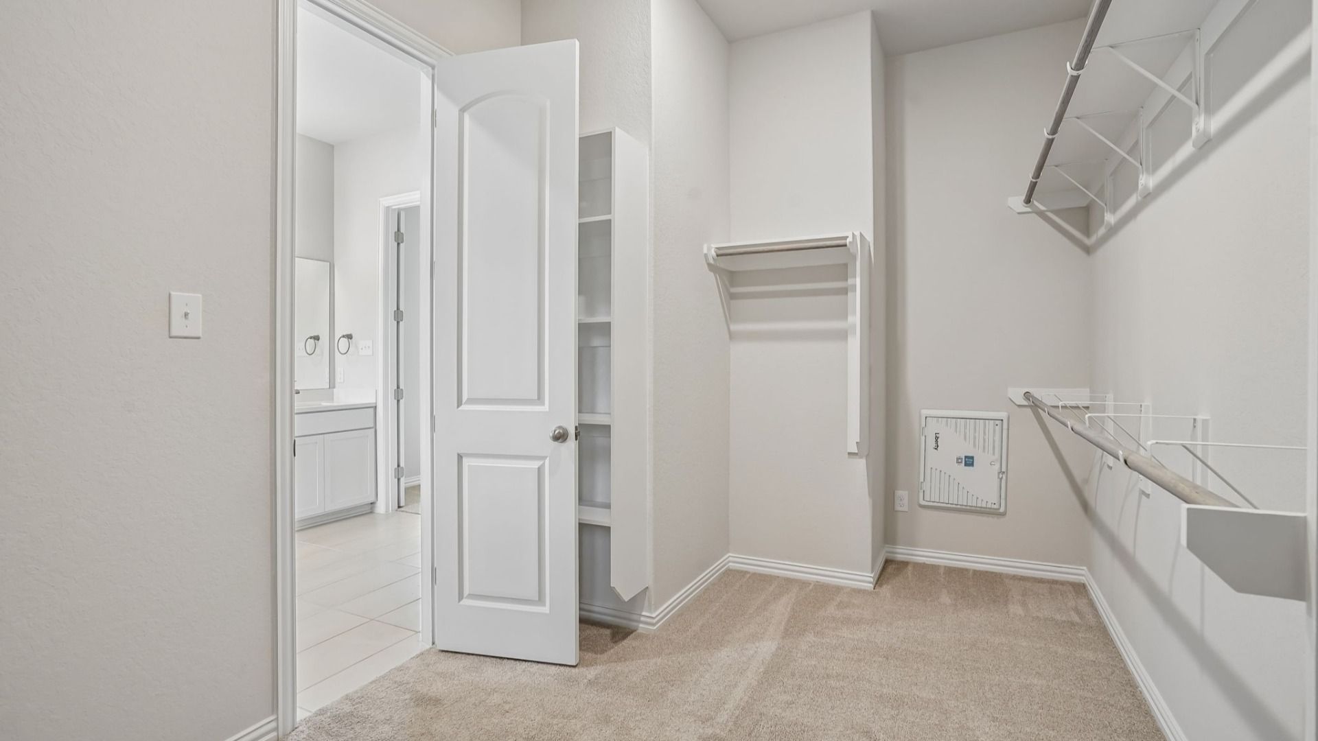 Generous owner's suite closet with plenty of room for storage and organization.