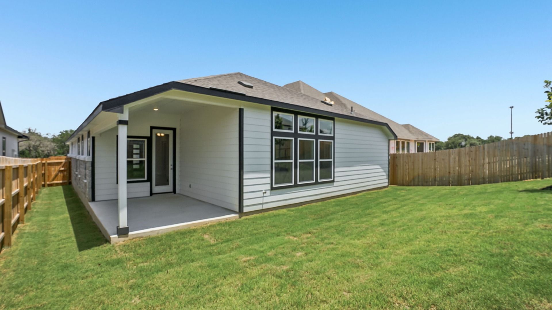 Covered patio perfect for relaxing or entertaining outdoors.